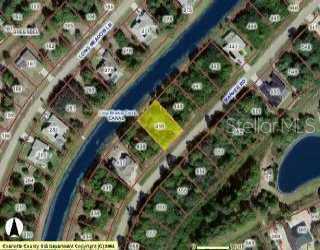 115 Marker Road Rotonda West, FL 33947 - Photo 1 of 1 an aerial view of a residential houses with yard