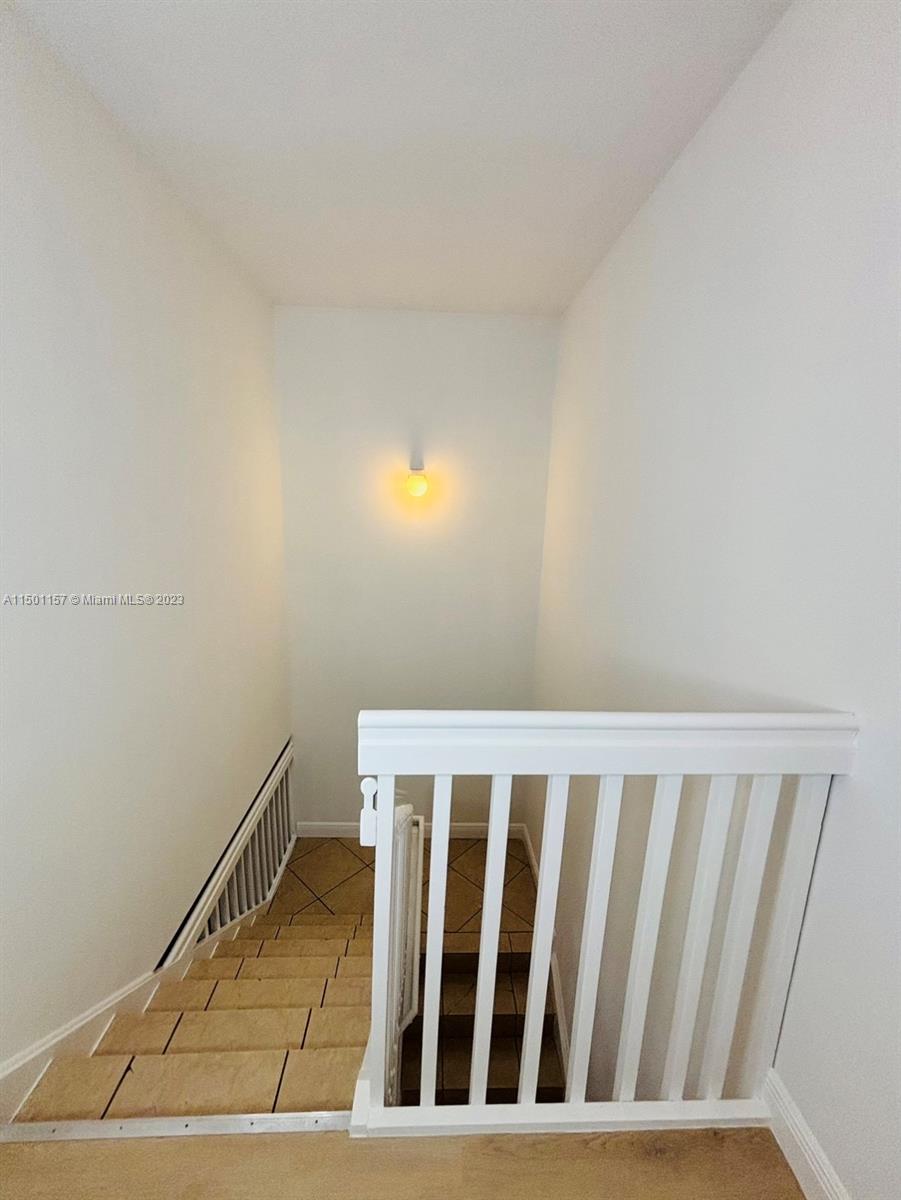 11115 West Okeechobee Road, Unit 181 Hialeah Gardens, FL 33018 - Photo 30 of 31 a view of wooden floor