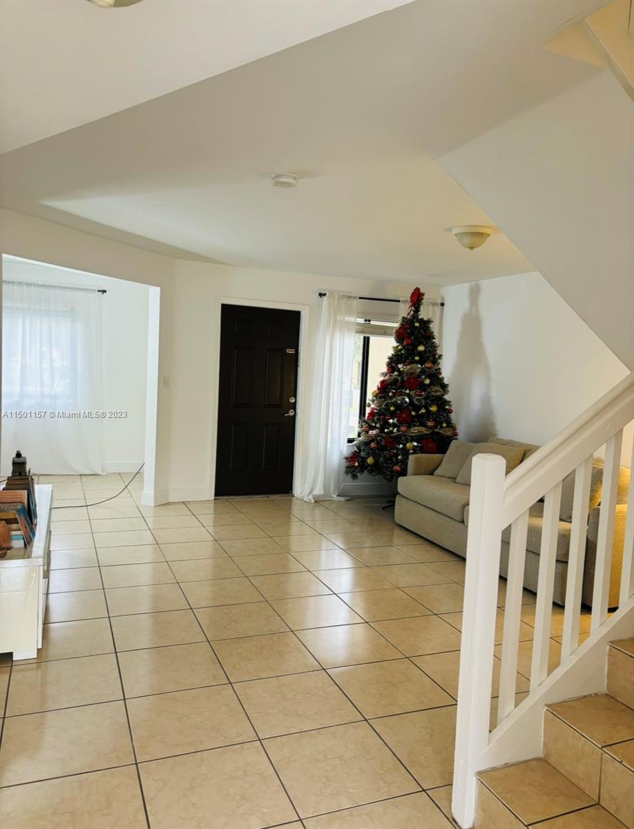 11115 West Okeechobee Road, Unit 181 Hialeah Gardens, FL 33018 - Photo 3 of 31 a view of a entryway of a house