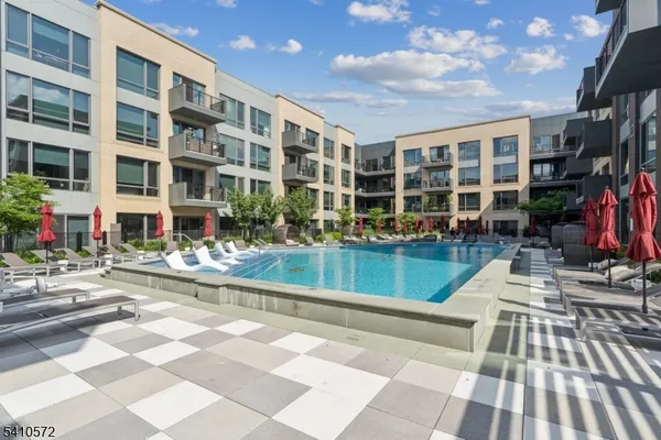 a view of pool with outdoor seating