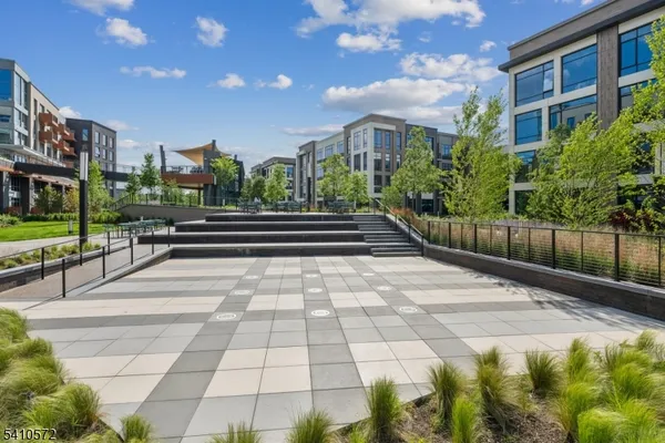 a view of a pathway with a building in the background