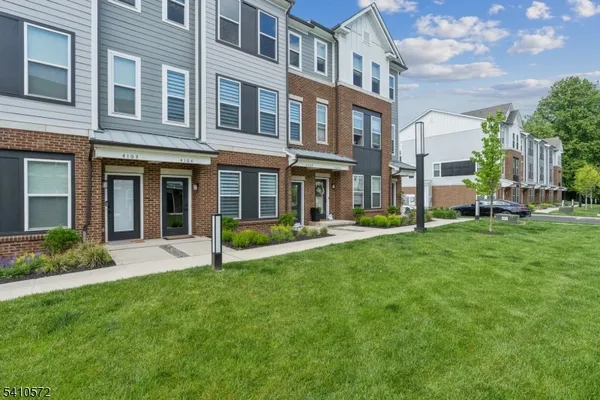 a view of an apartment with a garden and plants