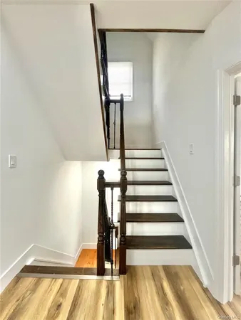 a view of entryway with wooden floor