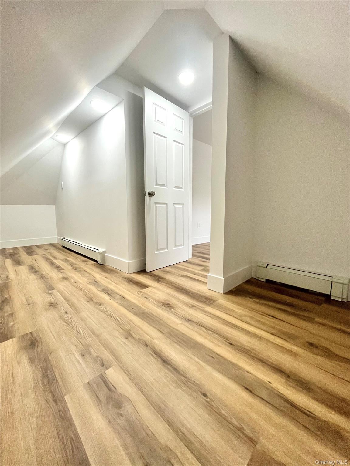 123 Clinton Avenue, Unit 2 New Rochelle, NY 10801 - Photo 21 of 27 a view of a livingroom with wooden floor