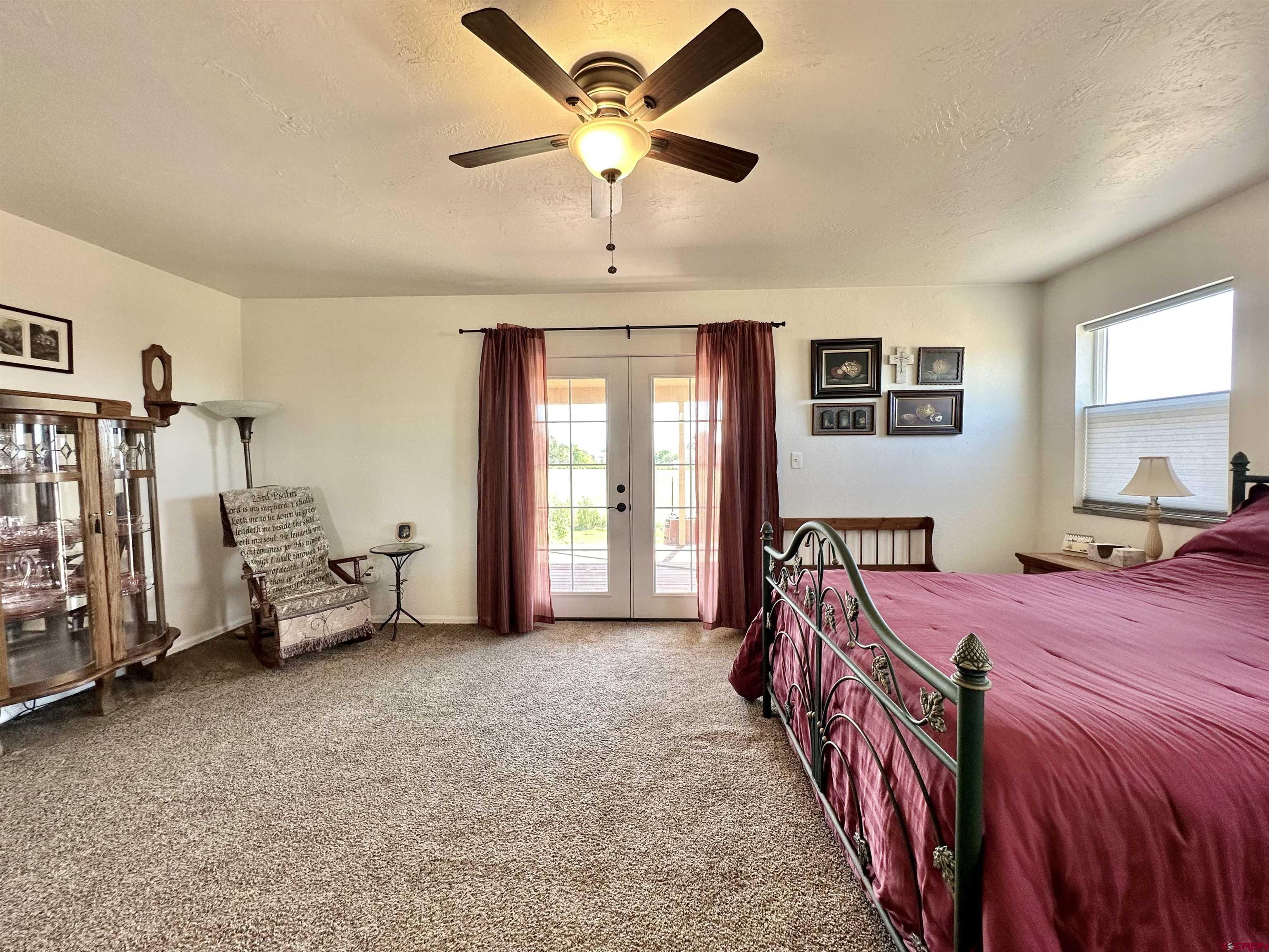 8352 2000th Road Austin, CO 81410 - Photo 18 of 35 a bed room with furniture and a window
