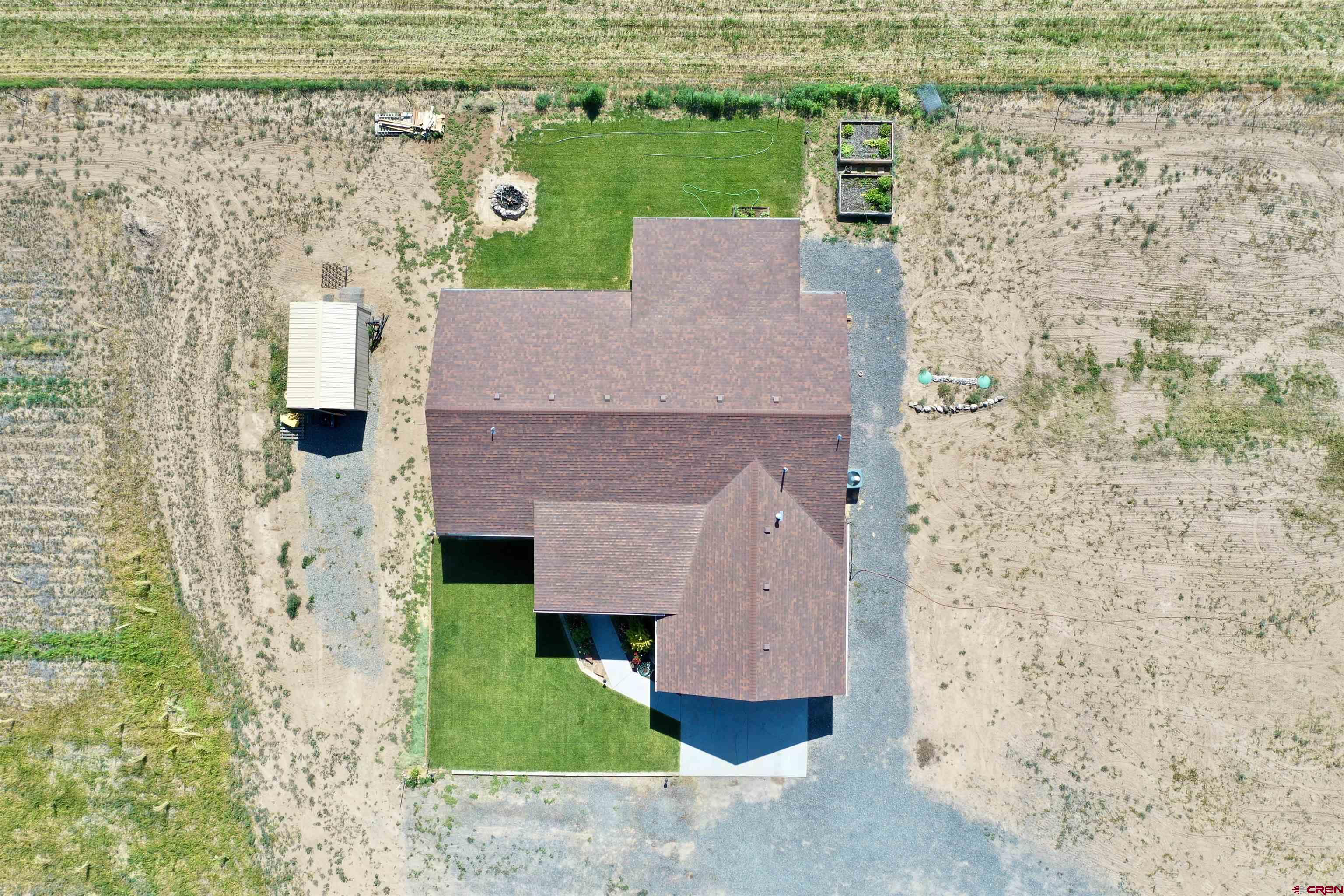 8352 2000th Road Austin, CO 81410 - Photo 30 of 35 a aerial view of a house with a yard