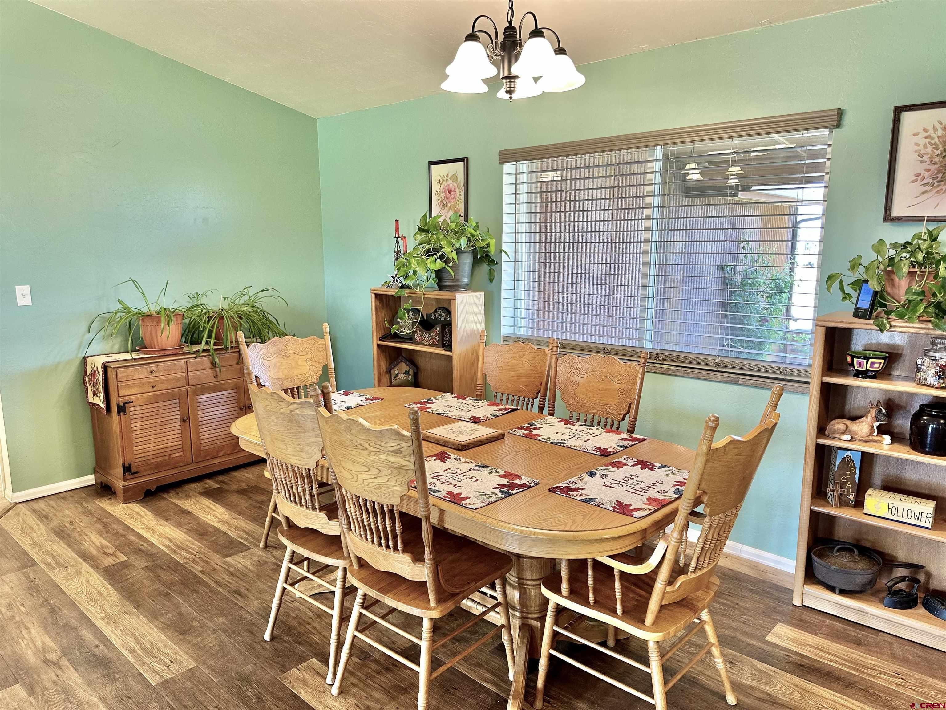 8352 2000th Road Austin, CO 81410 - Photo 4 of 35 a view of a dining room with furniture window and outside view