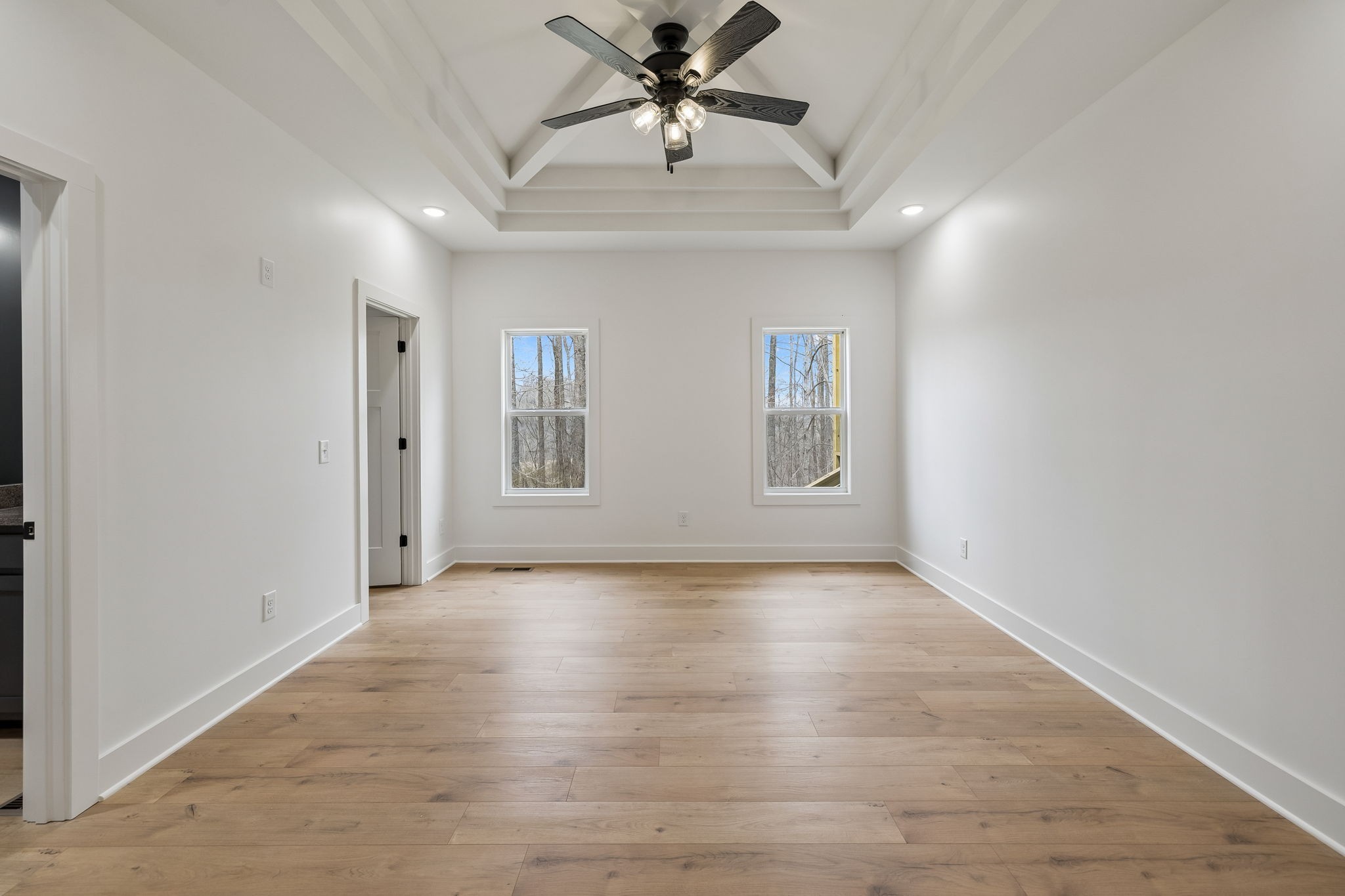 4083 Long Creek Road Lafayette, TN 37083 - Photo 23 of 36 wooden floor in an empty room with a window