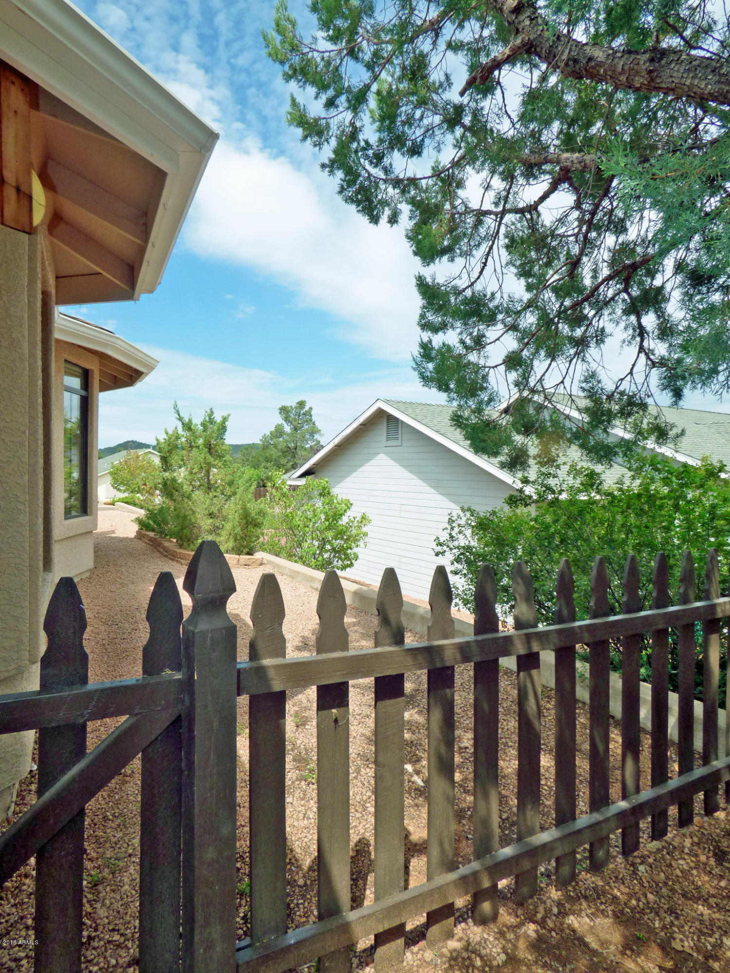 311 South Rim Rock Point Payson, AZ 85541 - Photo 14 of 23 Side Yard Off Covered Patio