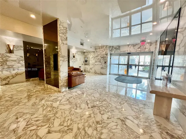 a large bathroom with a shower and a mirror