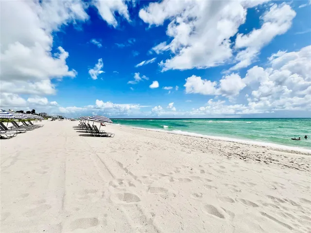 a view of a backyard of the house