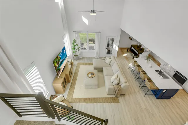 a white bath tub sitting in a bathroom and shower