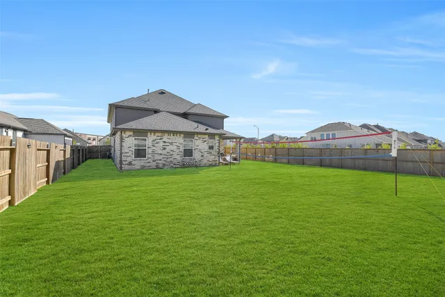 a outdoor living space with furniture and garden view