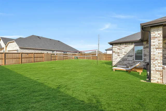 a view of a house with a big yard