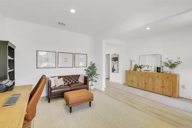 a bedroom with furniture and a couch