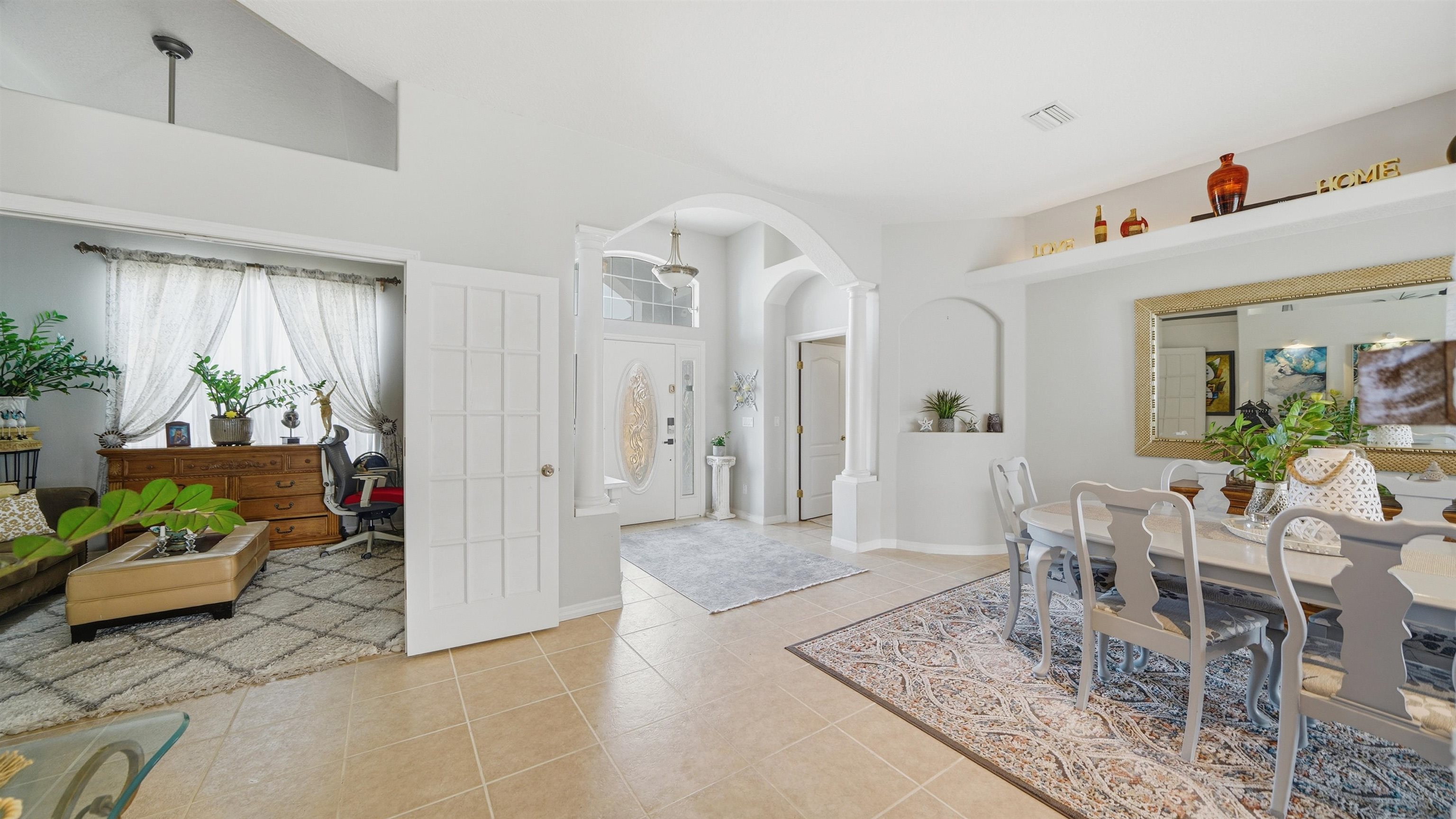 22 Flanders Lane Palm Coast, FL 32137 - Photo 23 of 70 a living room with furniture and a table