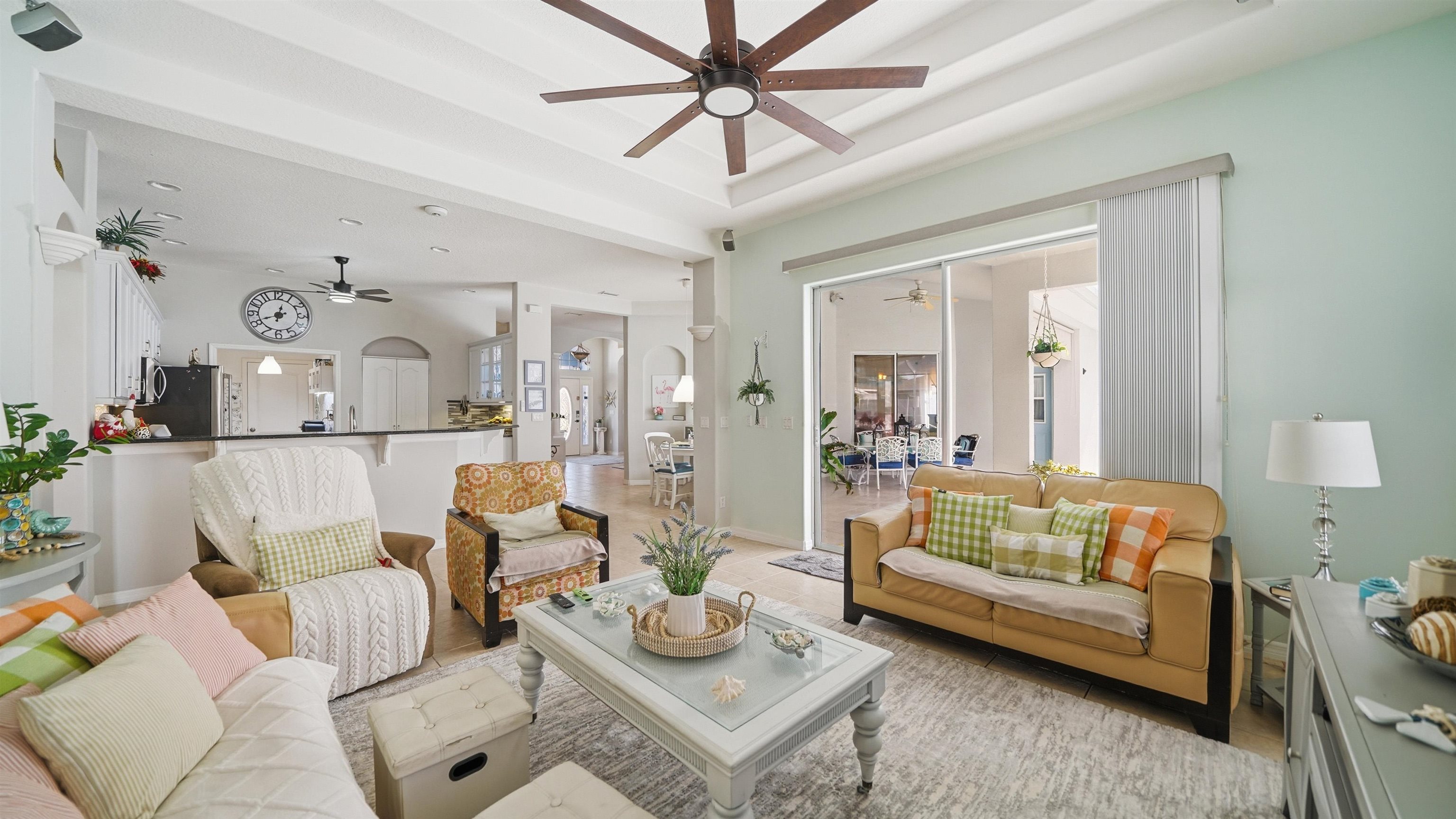 22 Flanders Lane Palm Coast, FL 32137 - Photo 36 of 70 a living room with furniture and a chandelier