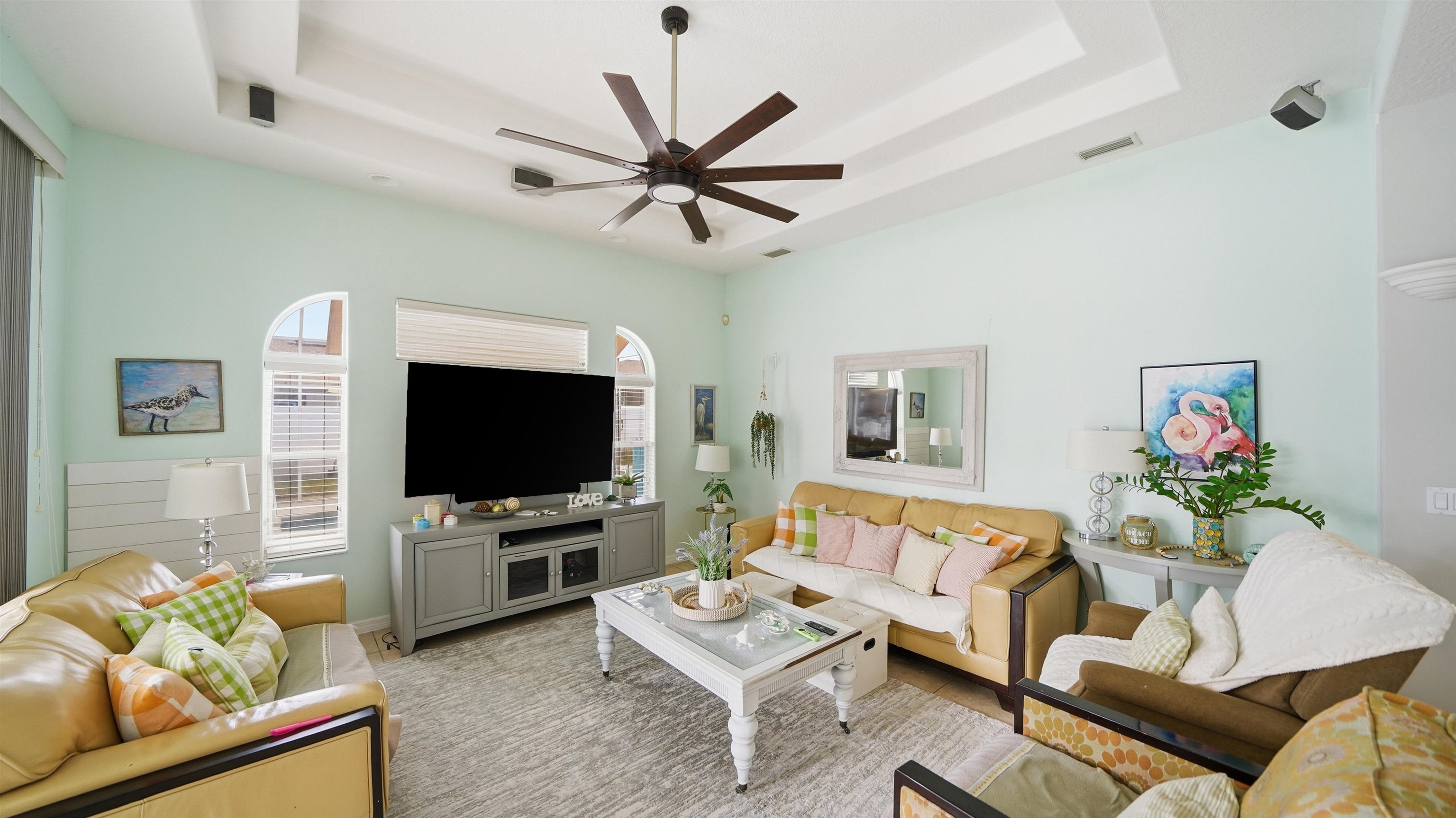22 Flanders Lane Palm Coast, FL 32137 - Photo 38 of 70 a living room with furniture and a flat screen tv