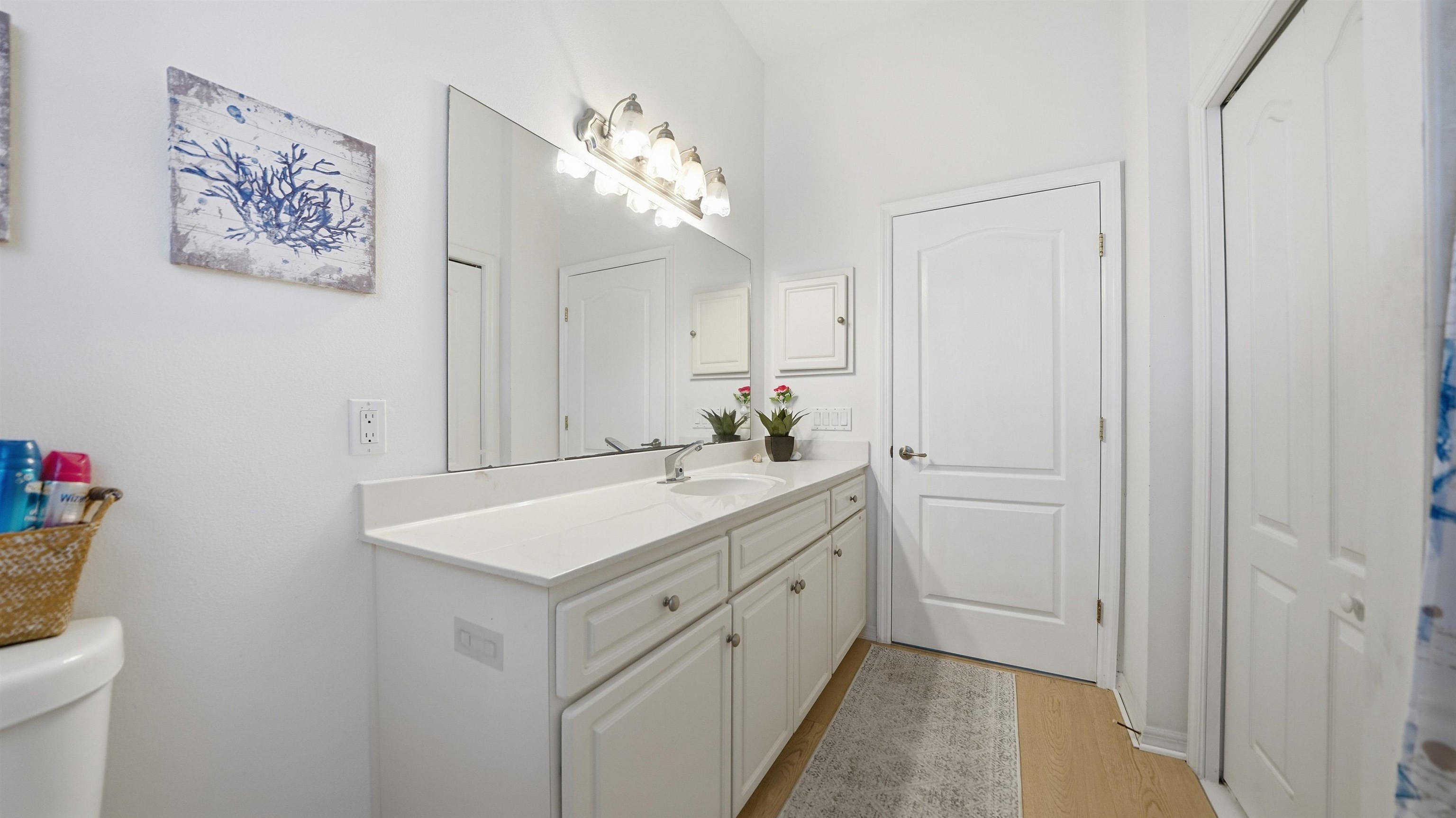 22 Flanders Lane Palm Coast, FL 32137 - Photo 42 of 70 a bathroom with a sink and a mirror