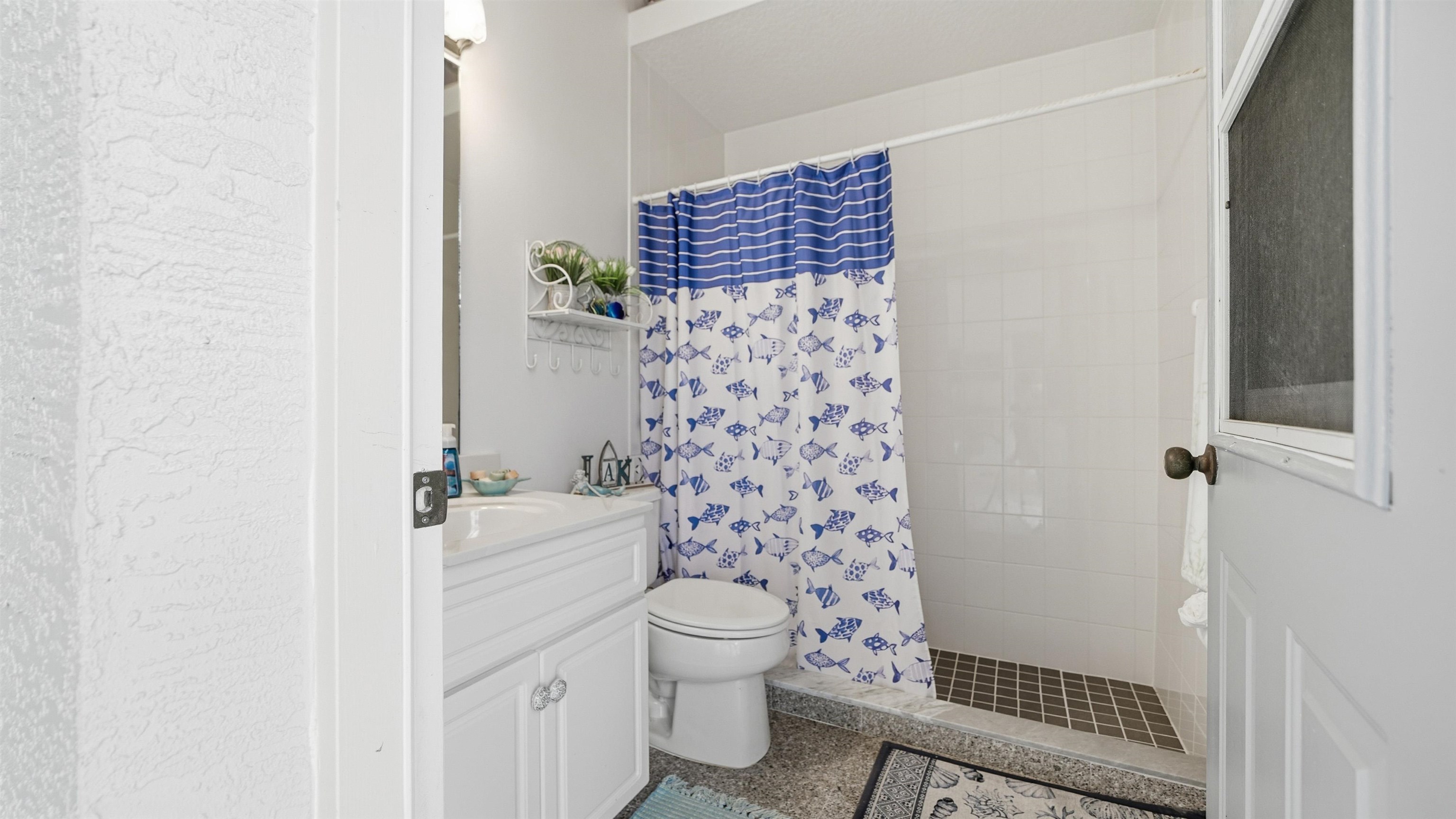 22 Flanders Lane Palm Coast, FL 32137 - Photo 46 of 70 a bathroom with a toilet and a shower
