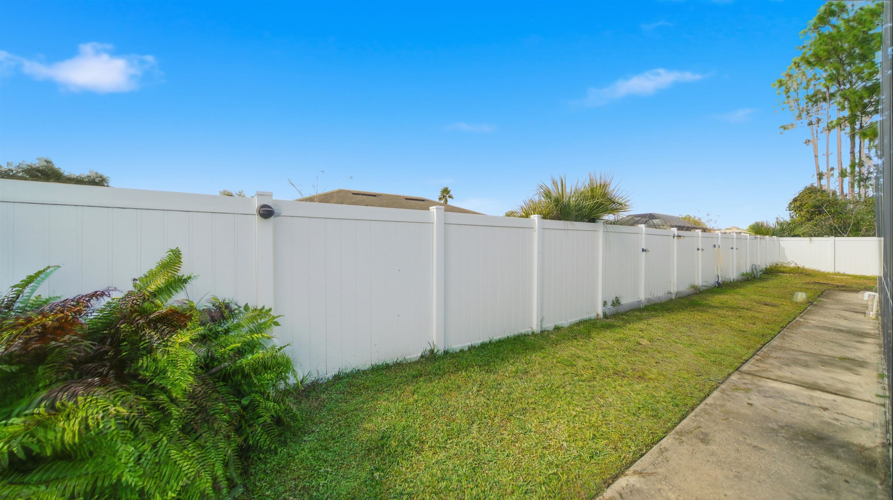 22 Flanders Lane Palm Coast, FL 32137 - Photo 56 of 70 View of fenced backyard