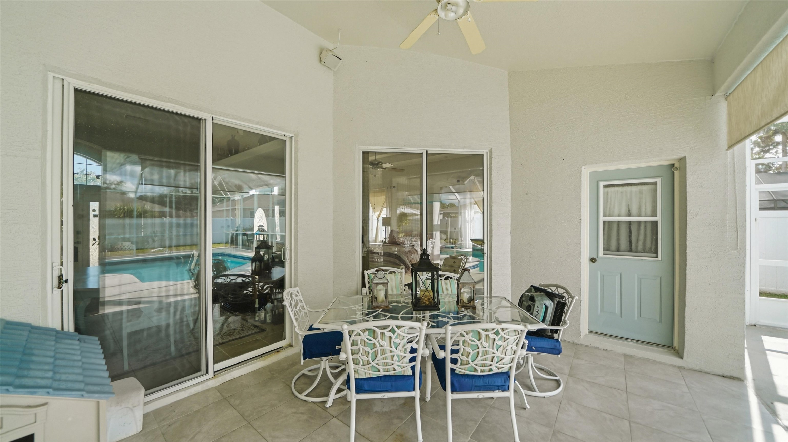 22 Flanders Lane Palm Coast, FL 32137 - Photo 60 of 70 a dining room with furniture and glass door