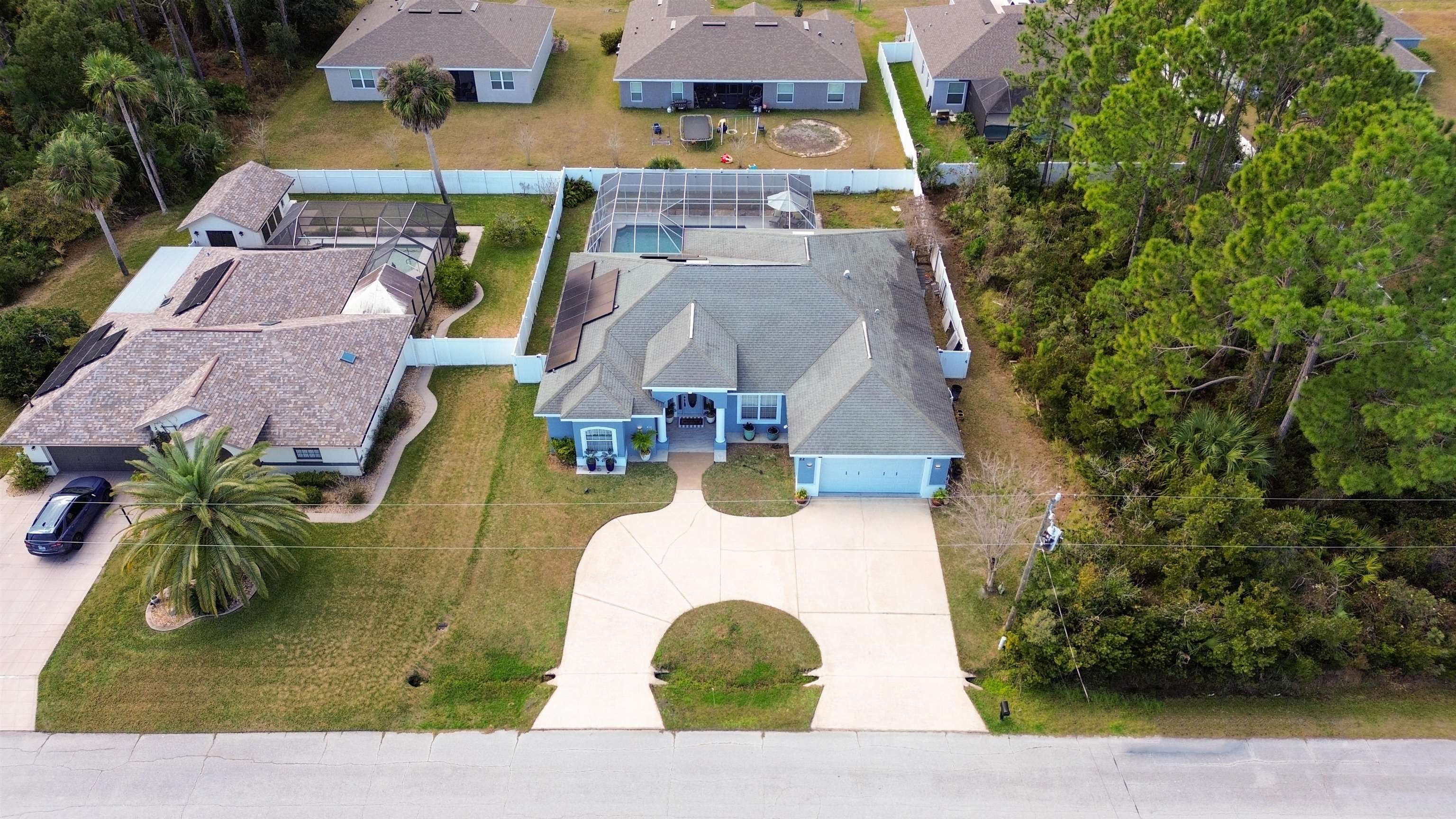 22 Flanders Lane Palm Coast, FL 32137 - Photo 63 of 70 an aerial view of a house with yard swimming pool and outdoor seating