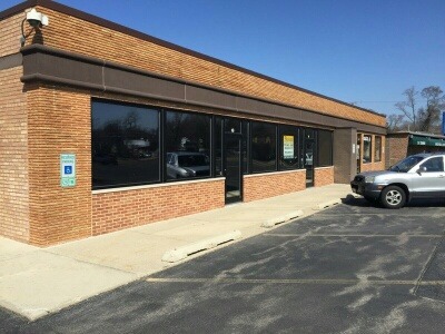 215 East State Road Island Lake, IL 60042 - Photo 1 of 11 a view of a car park of front of building