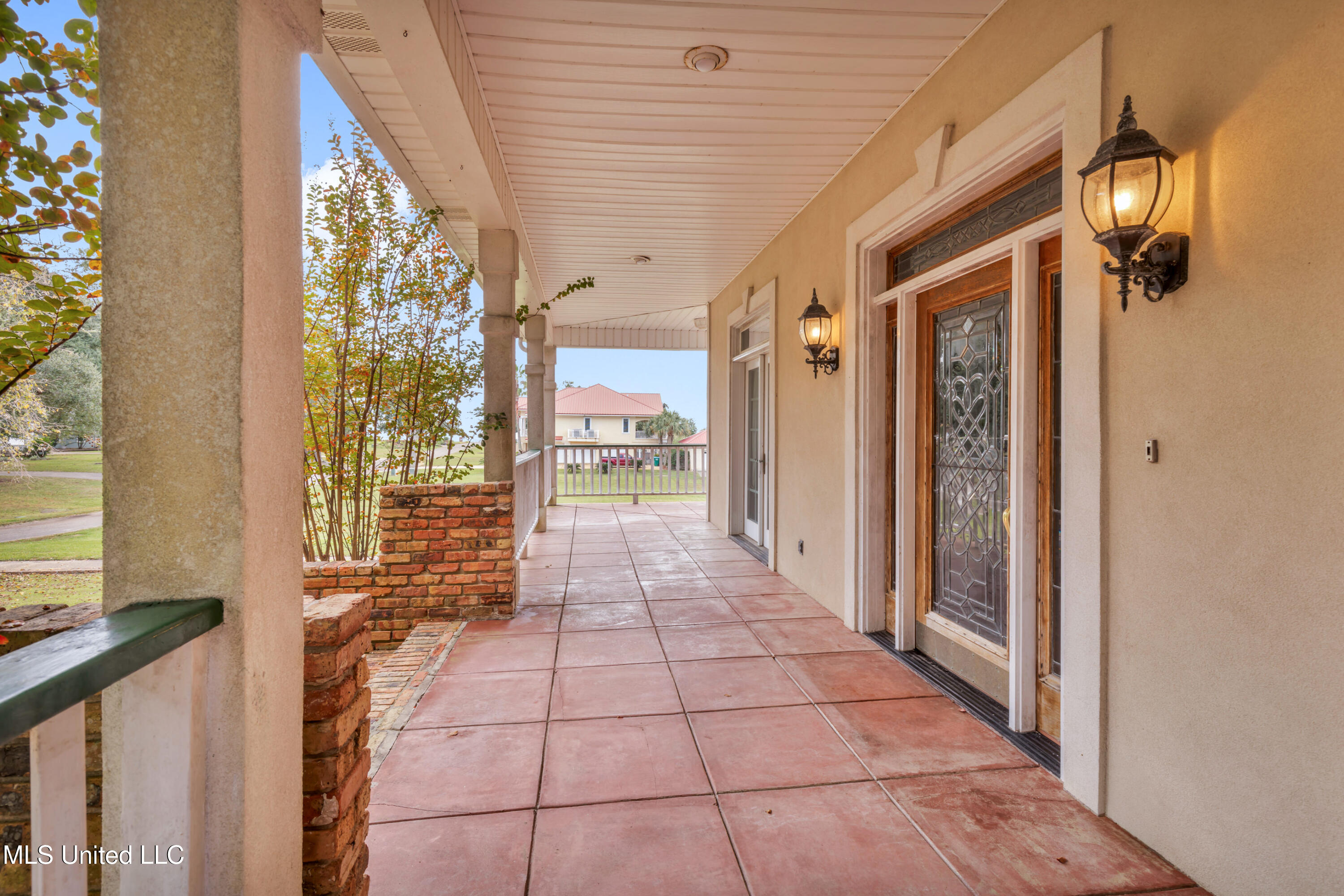 1401 Ladnier Road Gautier, MS 39553 - Photo 11 of 55 front porch veranda