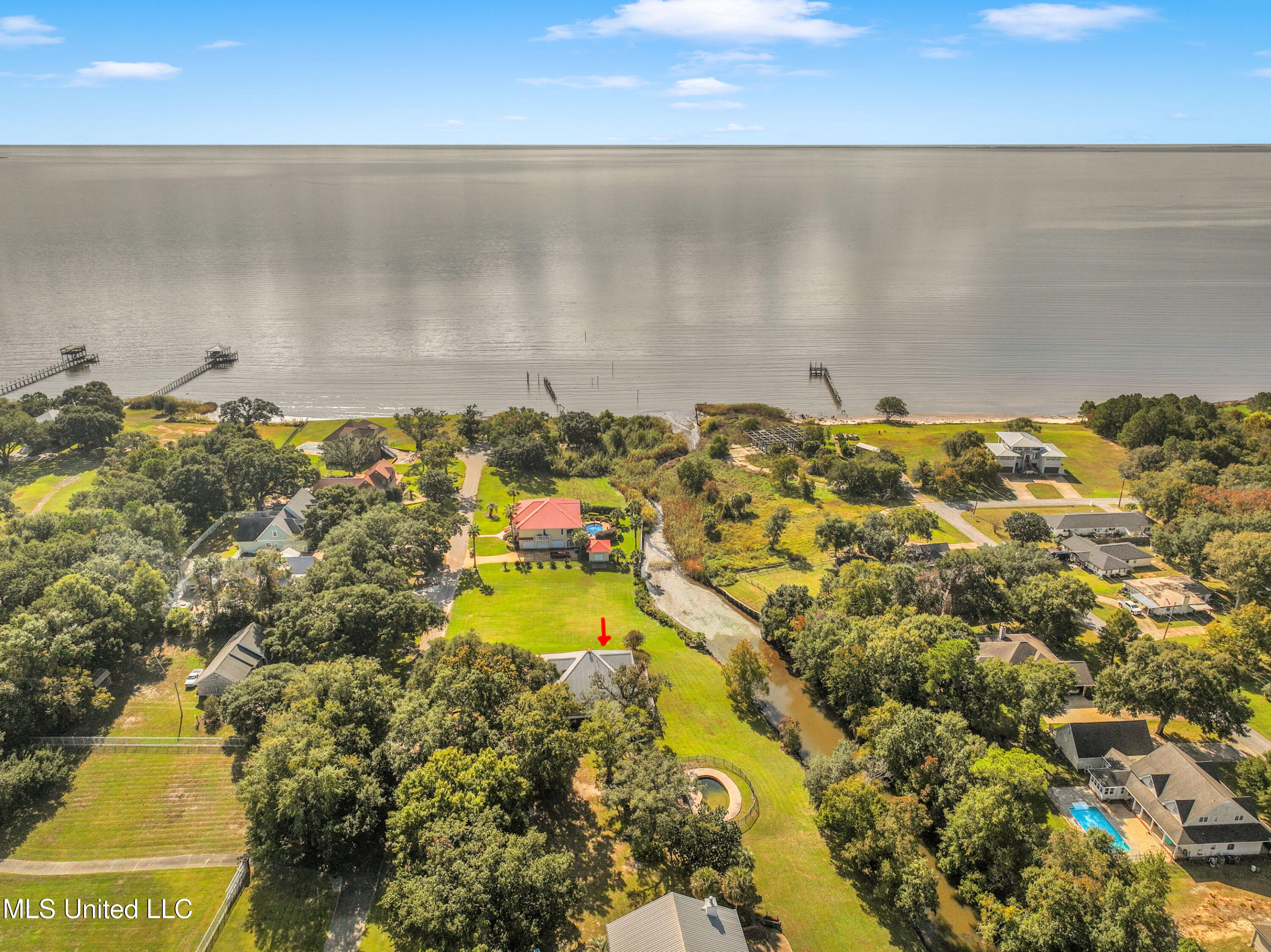 1401 Ladnier Road Gautier, MS 39553 - Photo 2 of 55 Steps to the beautiful Gulf Sound