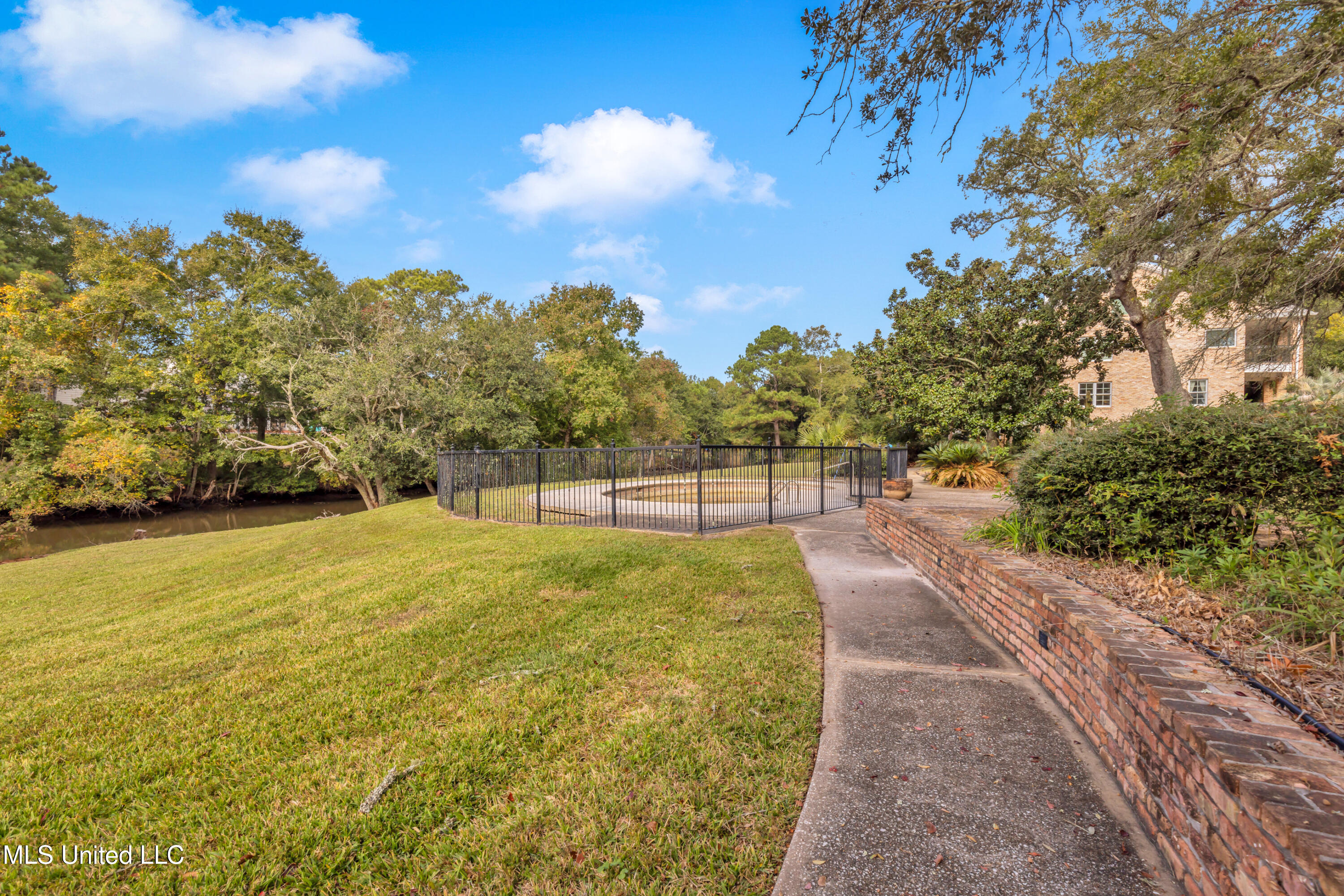 1401 Ladnier Road Gautier, MS 39553 - Photo 8 of 55 beautiful grounds and pool