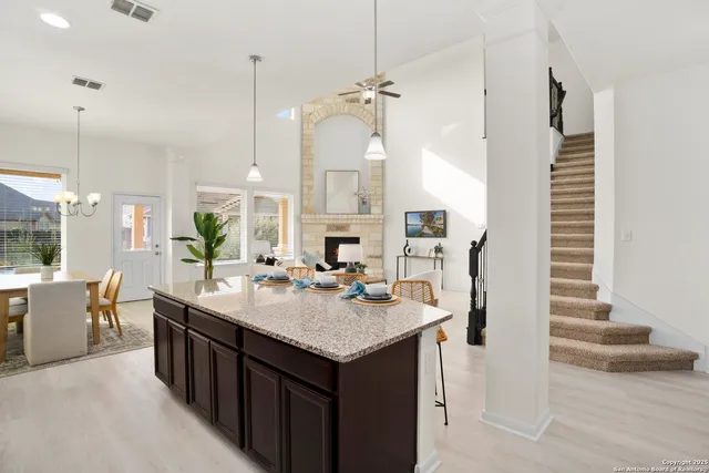 a bathroom with a sink double vanity and a mirror