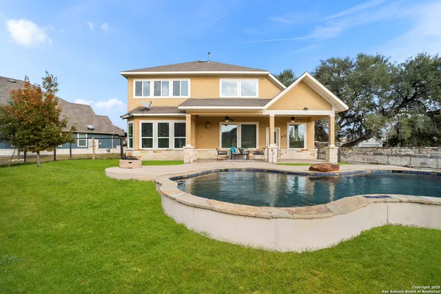 a view of a house with a swimming pool