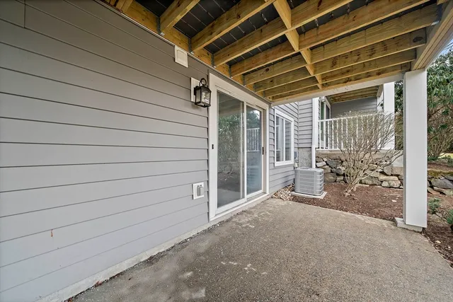 a view of a porch with seating space