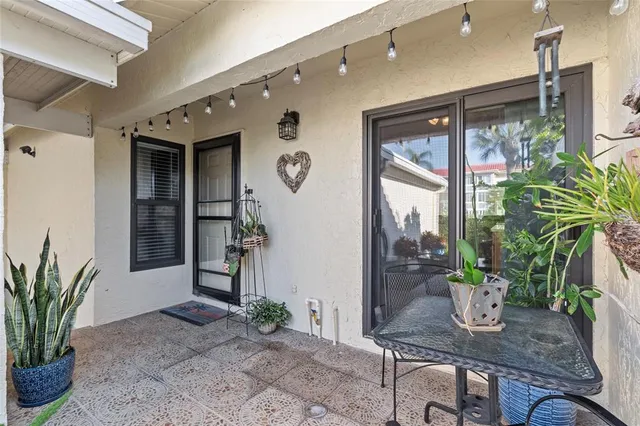 a dining room with a table and chairs