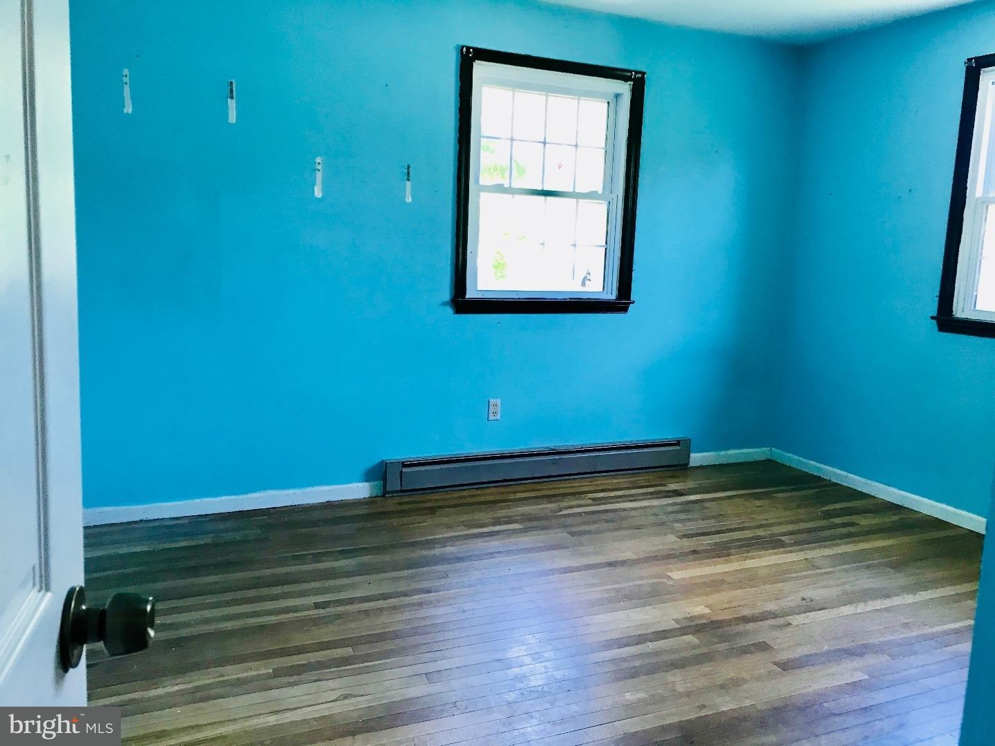 14 Annabeth Road Oley, PA 19547 - Photo 11 of 23 a view of empty room with wooden floor and fan