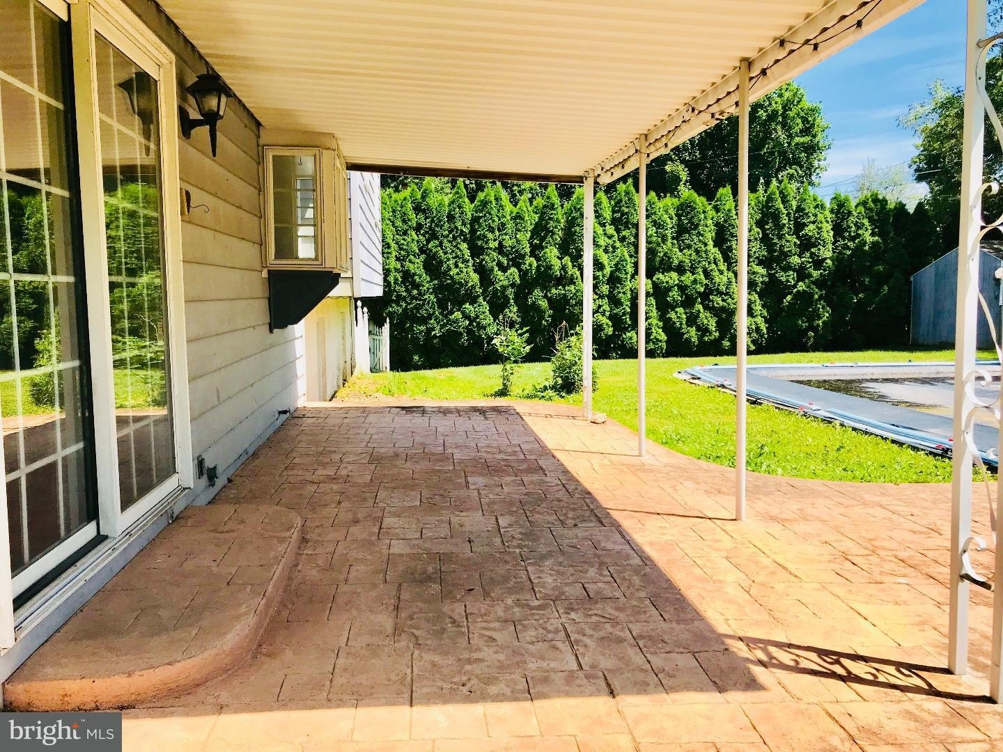 14 Annabeth Road Oley, PA 19547 - Photo 17 of 23 a view of a swimming pool with a porch
