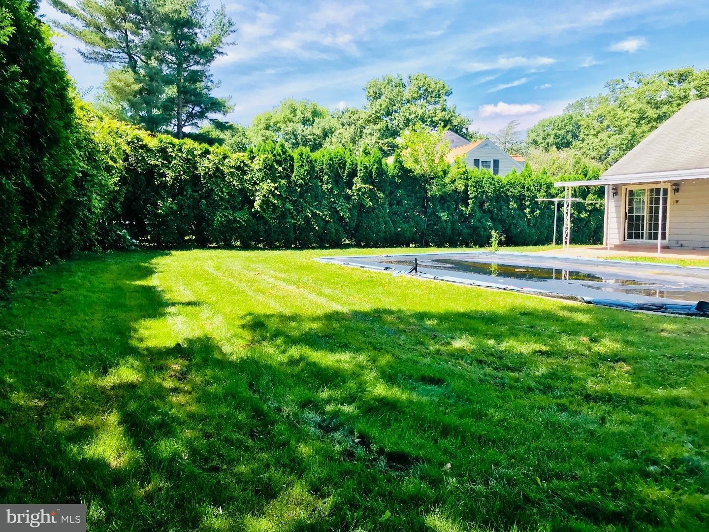 14 Annabeth Road Oley, PA 19547 - Photo 22 of 23 a view of a swimming pool with an outdoor space and seating area