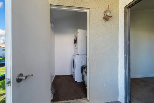 a view of hallway with closet