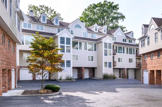 a front view of a building with street view