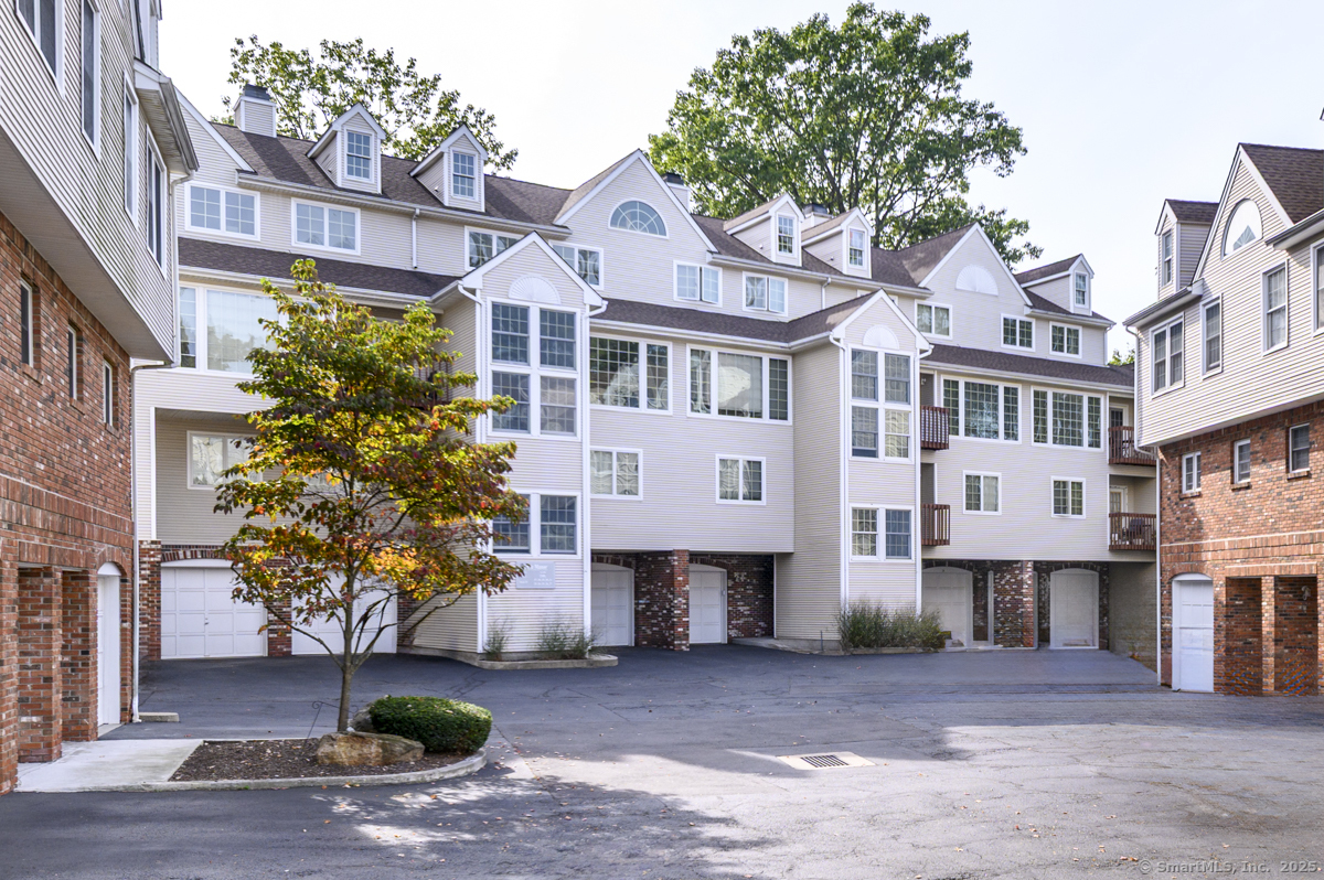 a front view of a building with street view