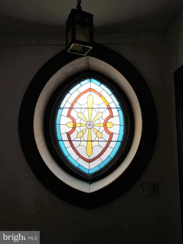 a view of entryway with a front door