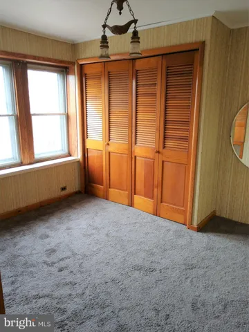 a bathroom with a sink a toilet and bathtub