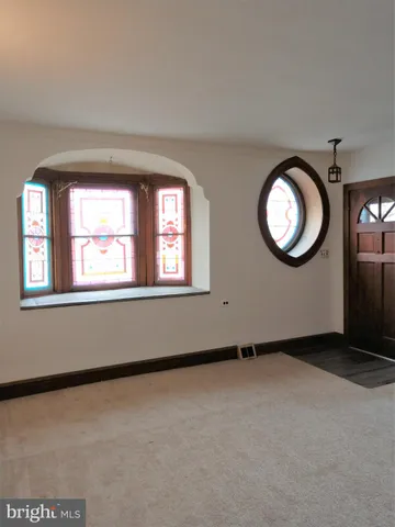 an empty room with windows