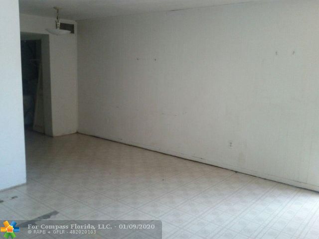 7851 Dunham Boulevard, Unit 5 Miami, FL 33138 - Photo 4 of 9 Living Room