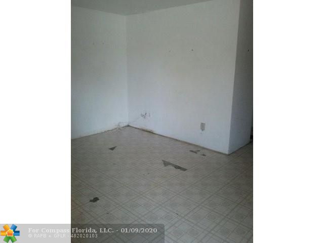 7851 Dunham Boulevard, Unit 5 Miami, FL 33138 - Photo 5 of 9 Living Room