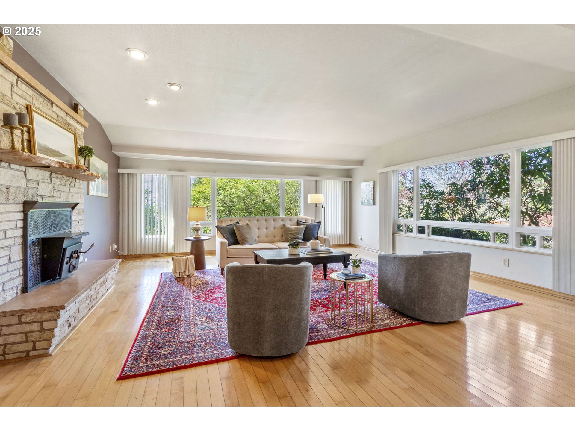 15960 Southwest Roshak Road Portland, OR 97224 - Photo 11 of 48 a living room with furniture and a fireplace