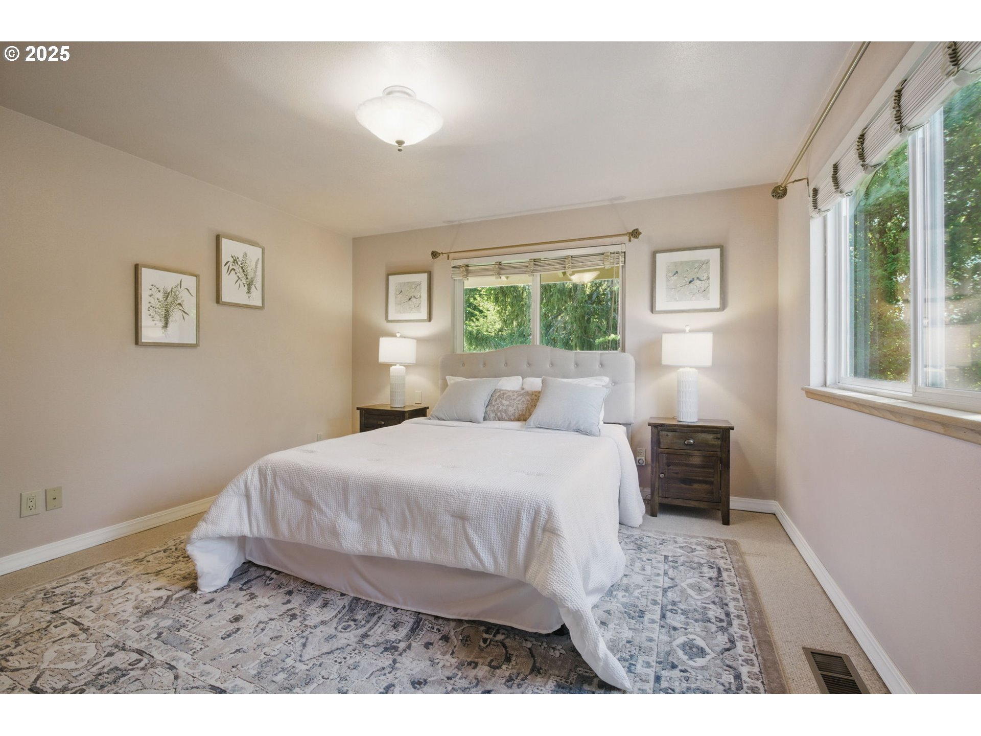 15960 Southwest Roshak Road Portland, OR 97224 - Photo 17 of 48 a bedroom with a bed and a window