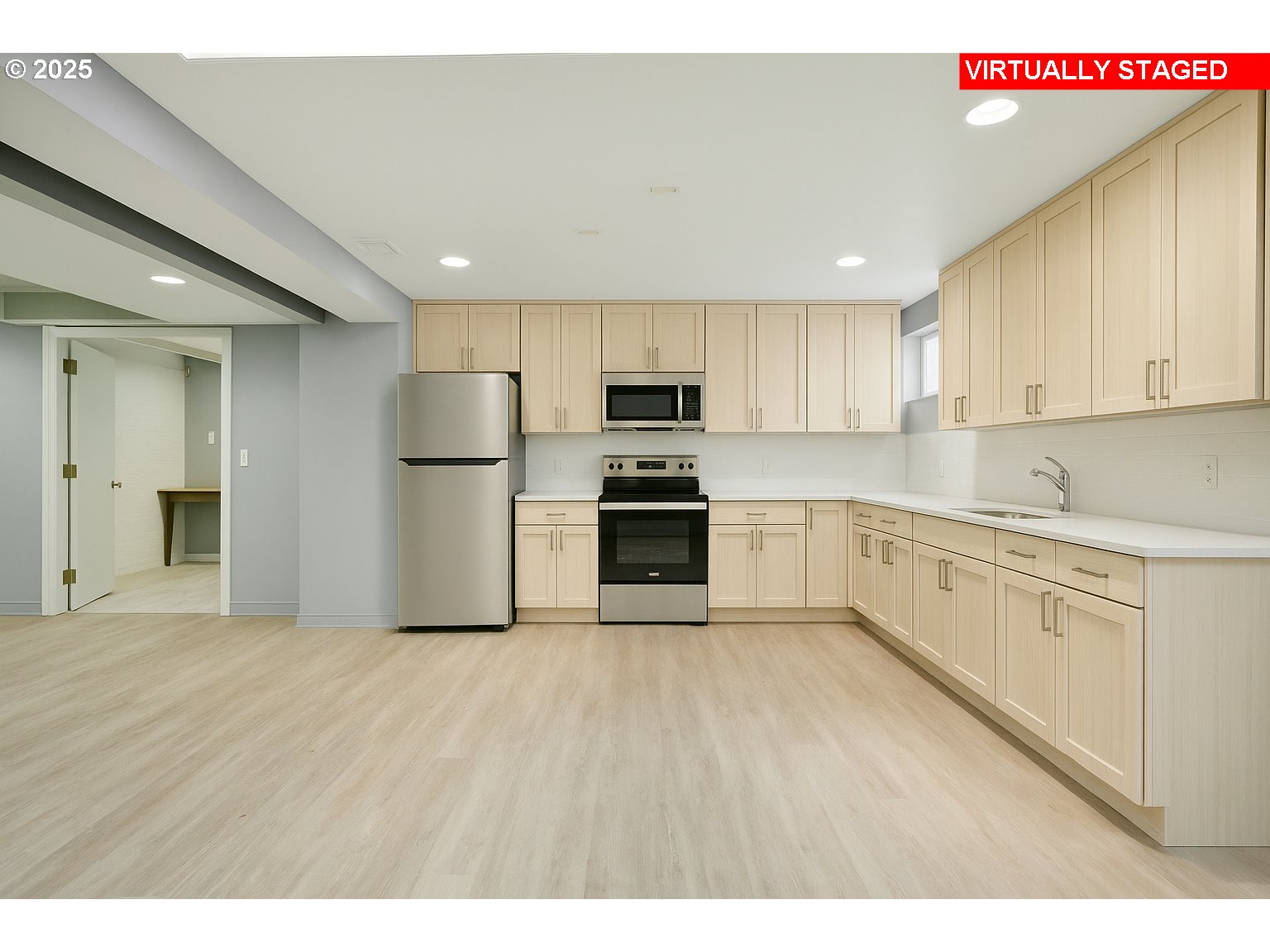 15960 Southwest Roshak Road Portland, OR 97224 - Photo 27 of 48 a kitchen with a refrigerator a stove top oven and white cabinets