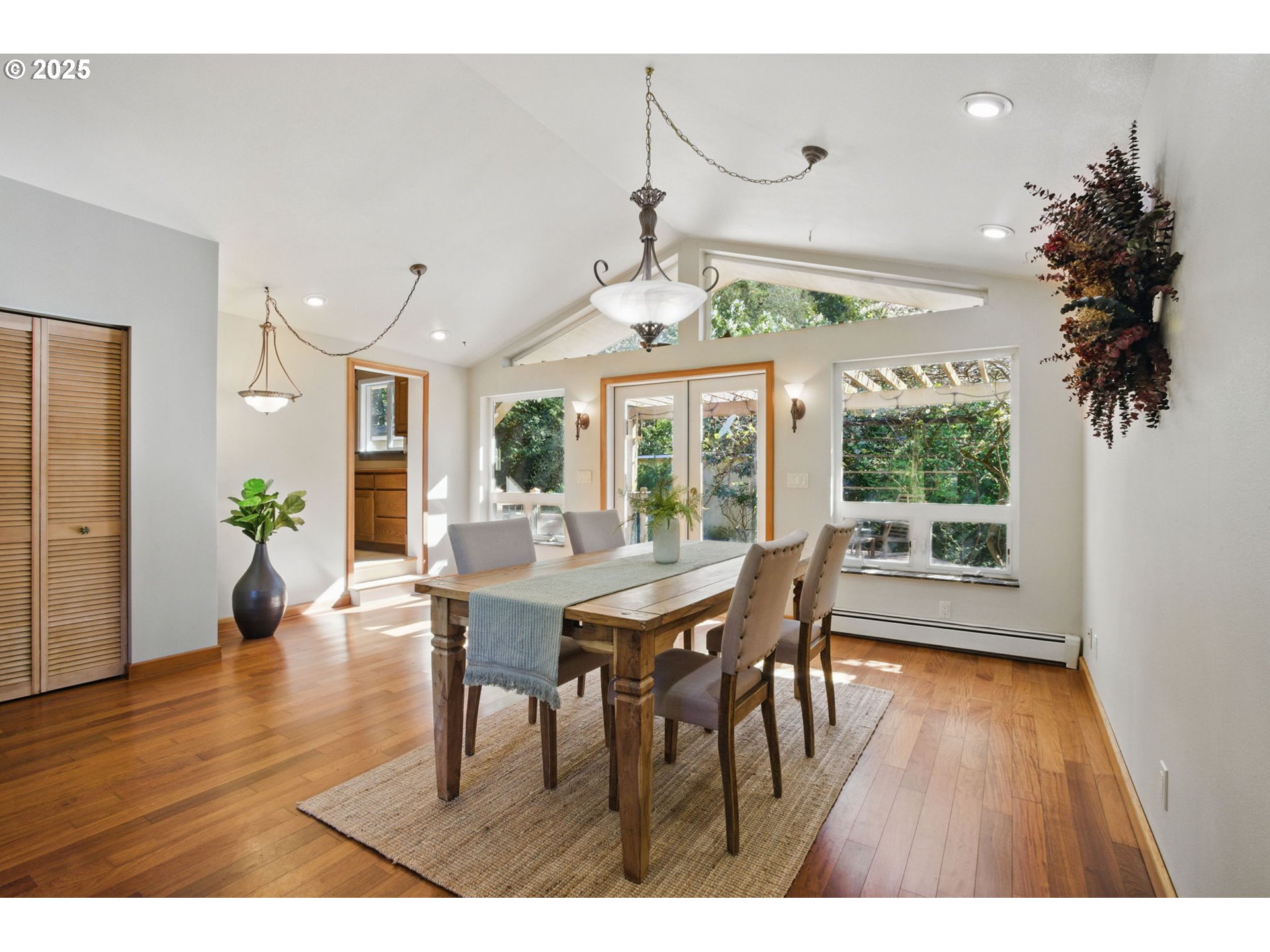 15960 Southwest Roshak Road Portland, OR 97224 - Photo 3 of 48 a view of a dining room with furniture window and wooden floor